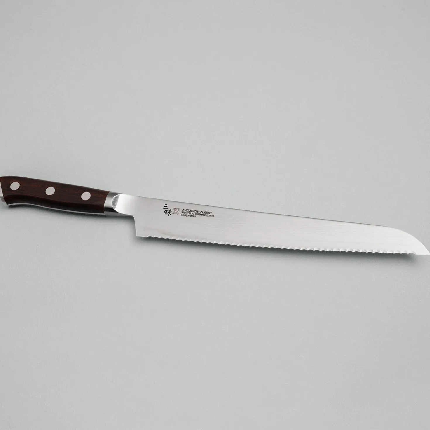 Mcusta Zanmai Premium Ironwood Broodmes 23 cm